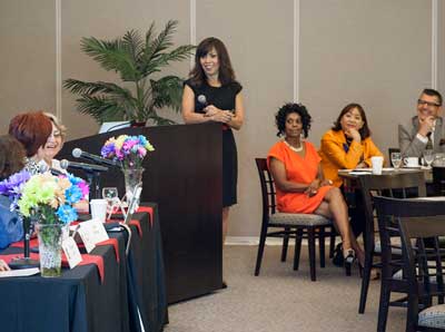 TIPS coordinator Jo‑Ann Cuevas moderates a panel reviewing 25 years of TIPS group contributions