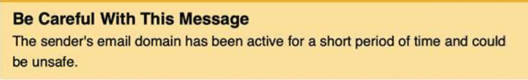 Yellow warning label that reads "Be careful with this message. The sender's email domain has been active for a short period of time and could be unsafe." 