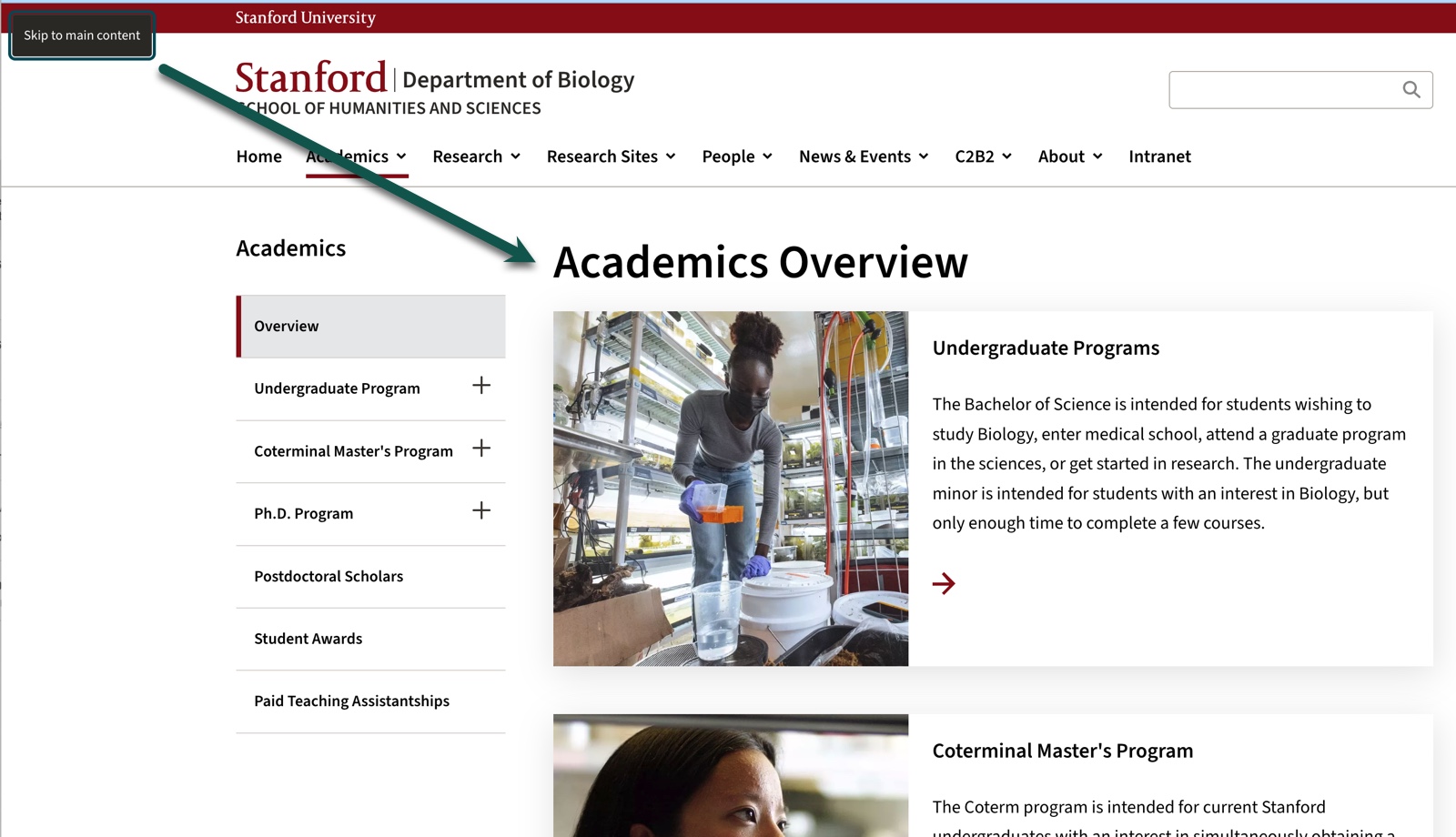 Biology Academics showing the exposed skip link and an arrow indicating the target of the main content of the page.