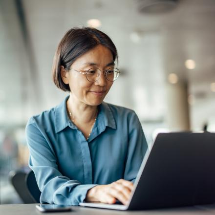 Image of woman using her laptop