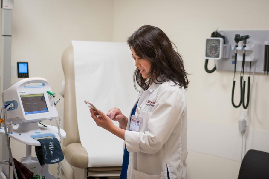 health care woman on cell phone