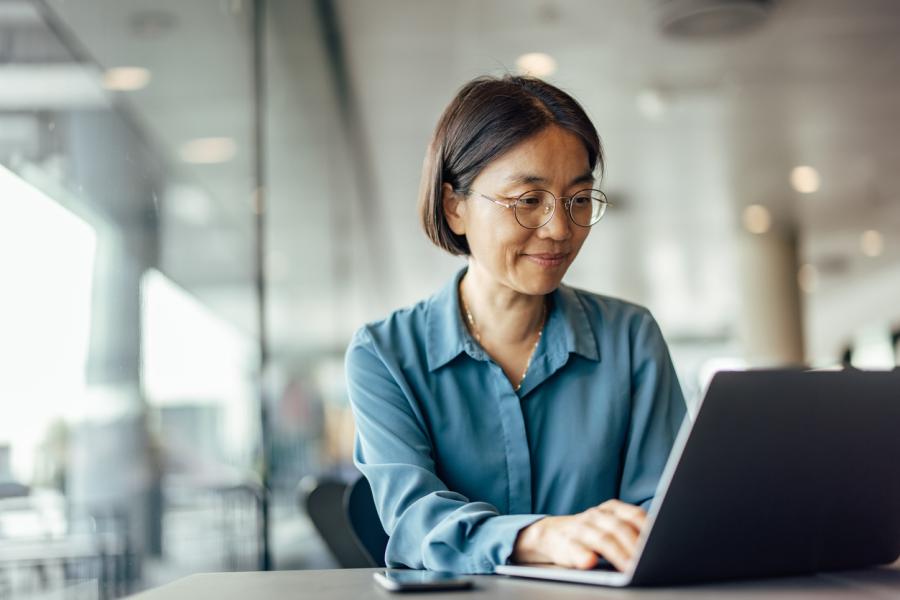 Image of woman using her laptop